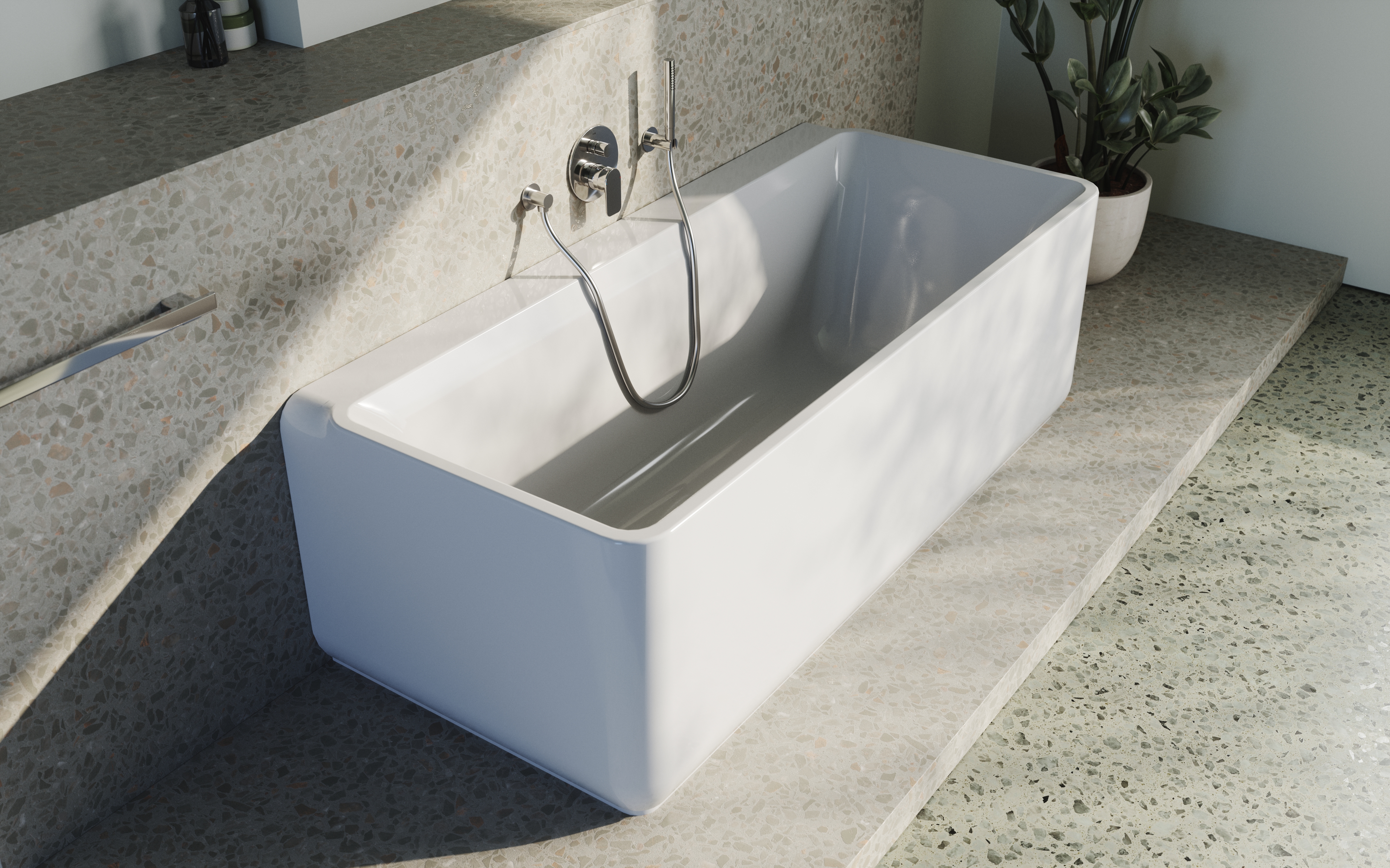 Eine moderne, rechteckige Badewanne in einem minimalistischen Badezimmer. Die Wände und der Boden sind mit Terrazzo-Fliesen verkleidet, und die Armaturen aus Chrom sind an der Wand montiert. Eine grüne Pflanze steht dekorativ im Hintergrund.